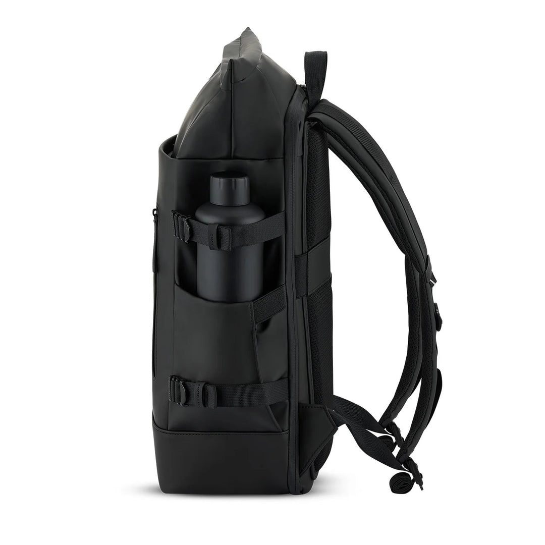 Side view with water bottle pocket on the all-black Helsinki Pro rolltop daypack
