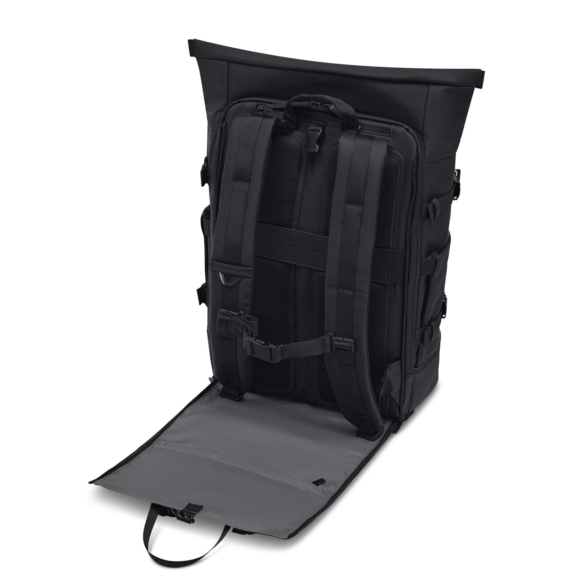 Back panel opened in black revealing padded shoulder straps and breathable mesh