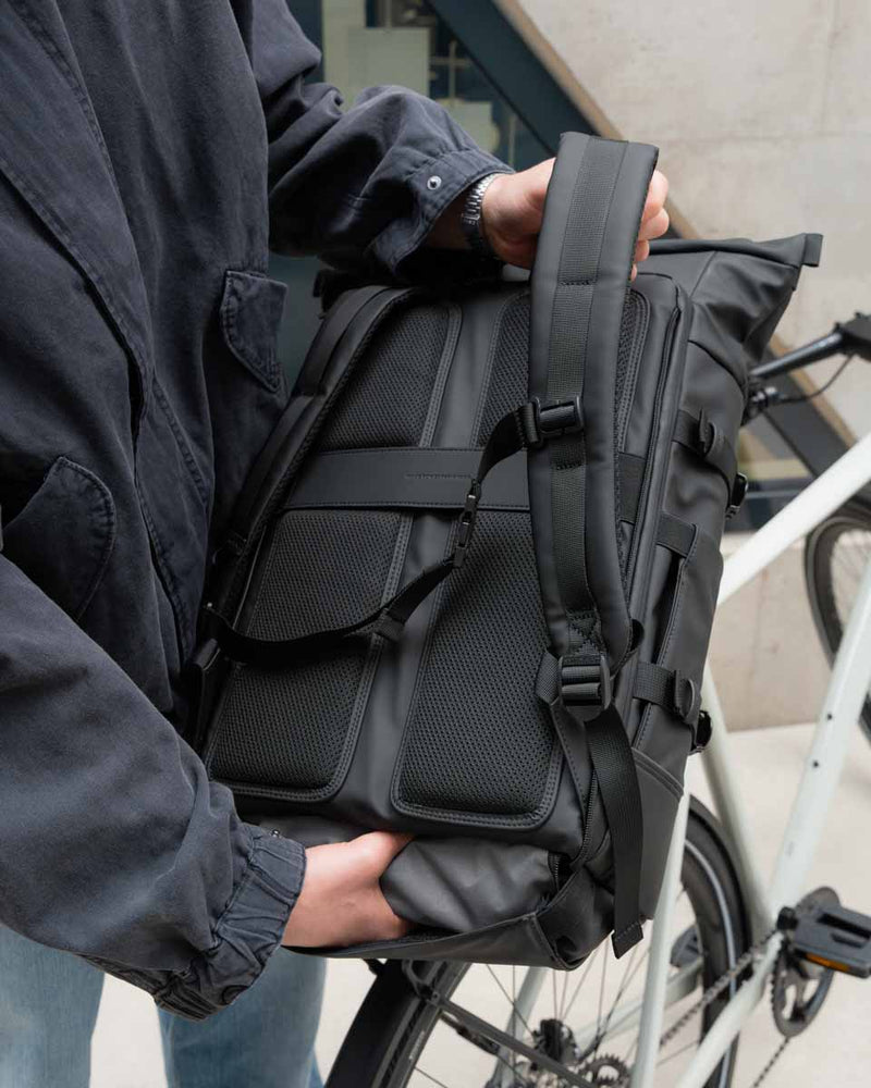 Padded shoulder straps coming out from under the Click & Go panel
