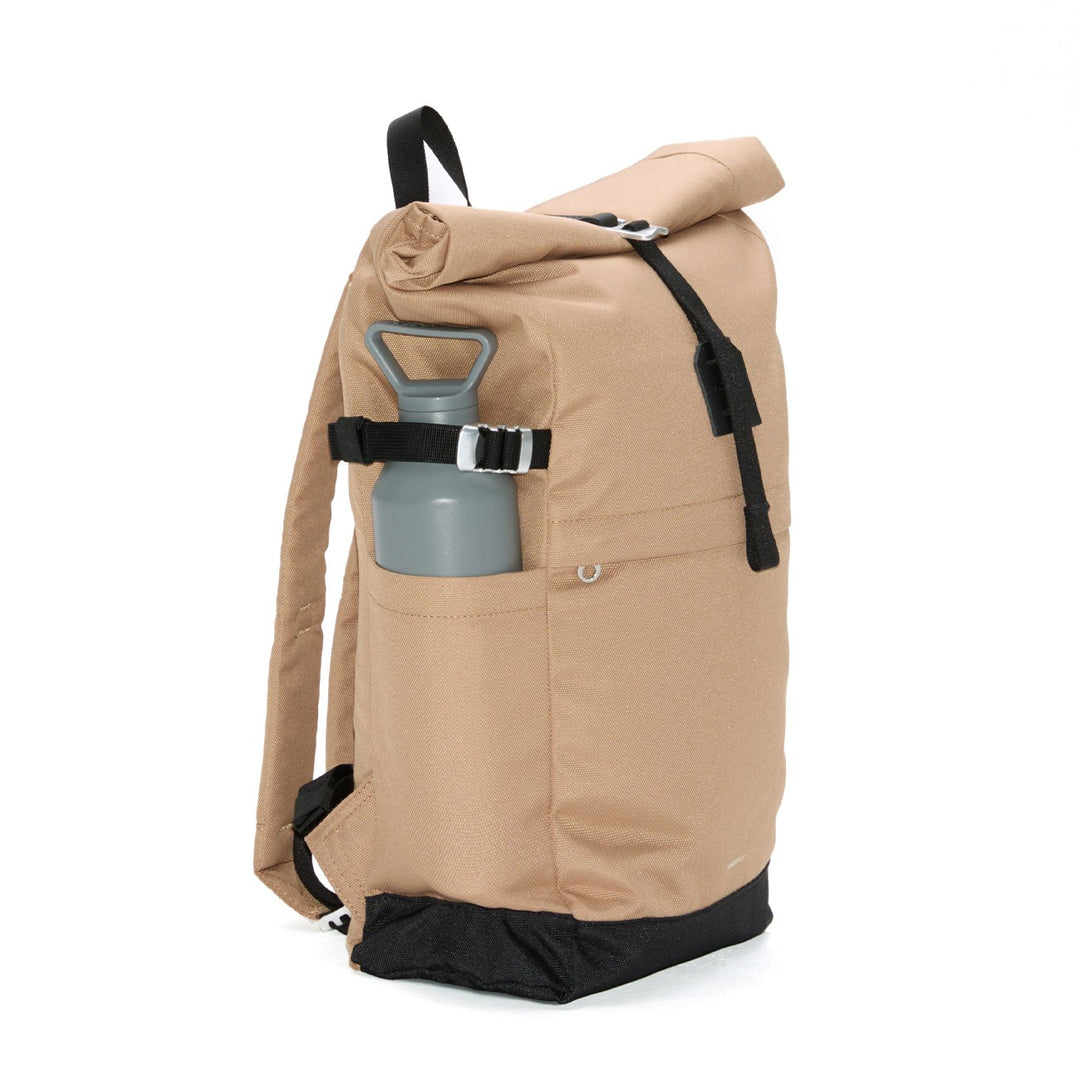 Beige Icon Rolltop 14" backpack side view with grey water bottle in elastic pocket