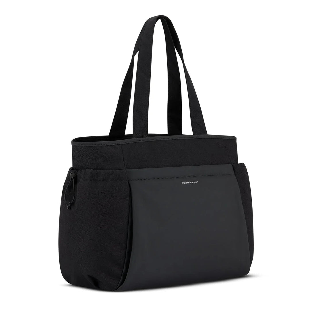 Side angle showing drawstring pocket and logo — black