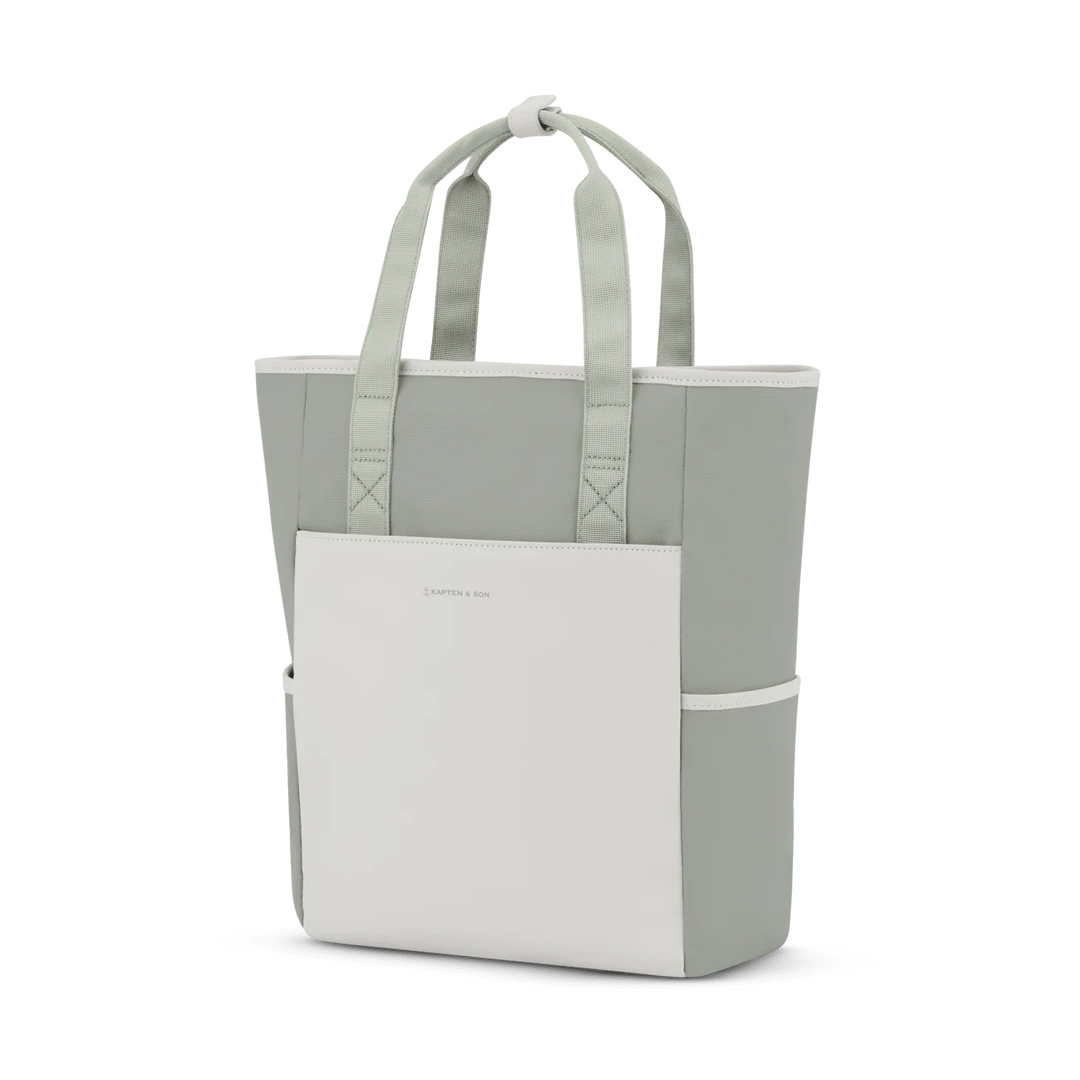 Side view showing side pocket and logo — muted sage