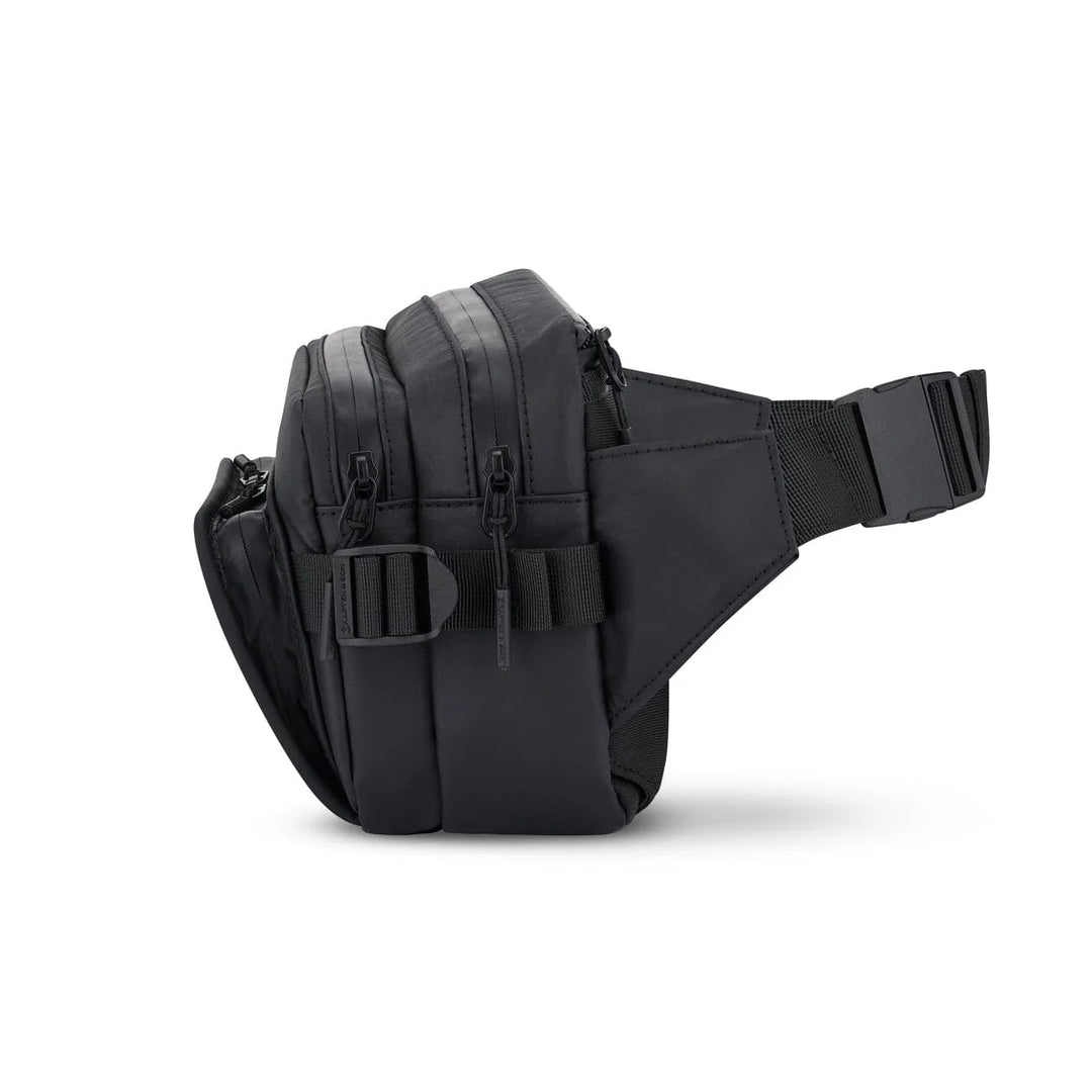 Side profile showing depth and buckle strap attachment
