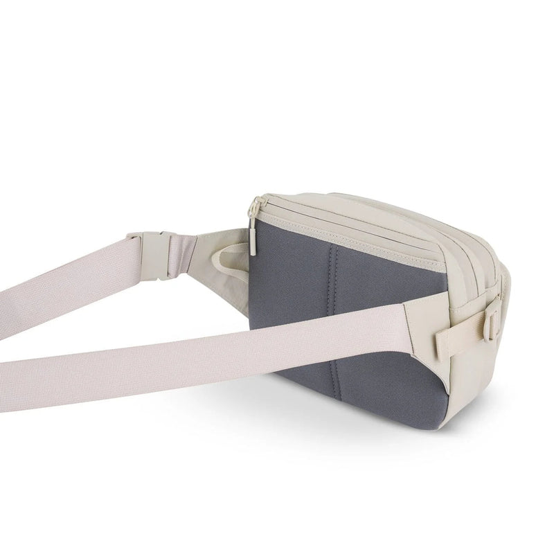 Rear view with adjustable webbing strap and back panel — sandstone