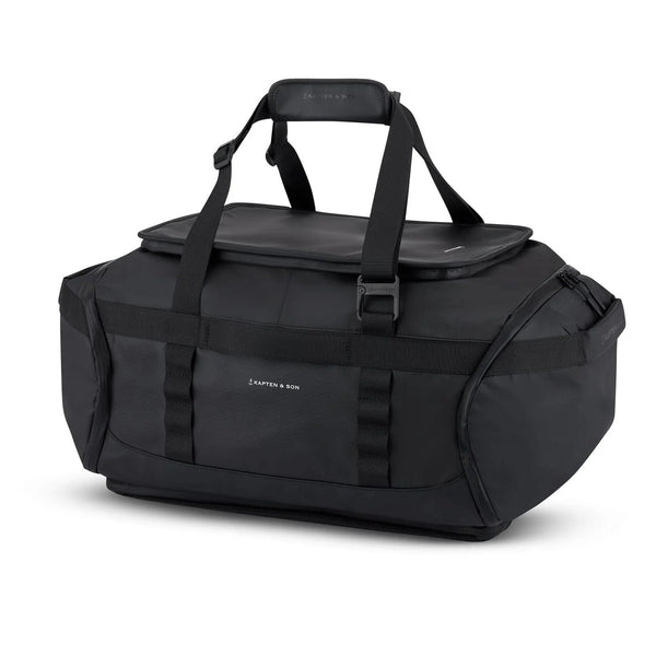 Kapten & Son Lisbon Duffle Backpack Medium 50L in black — side view with grab handles