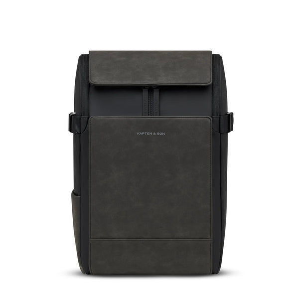Kapten & Son Bali Medium Backpack in black — structured travel backpack with flap closure and vegan suede panel