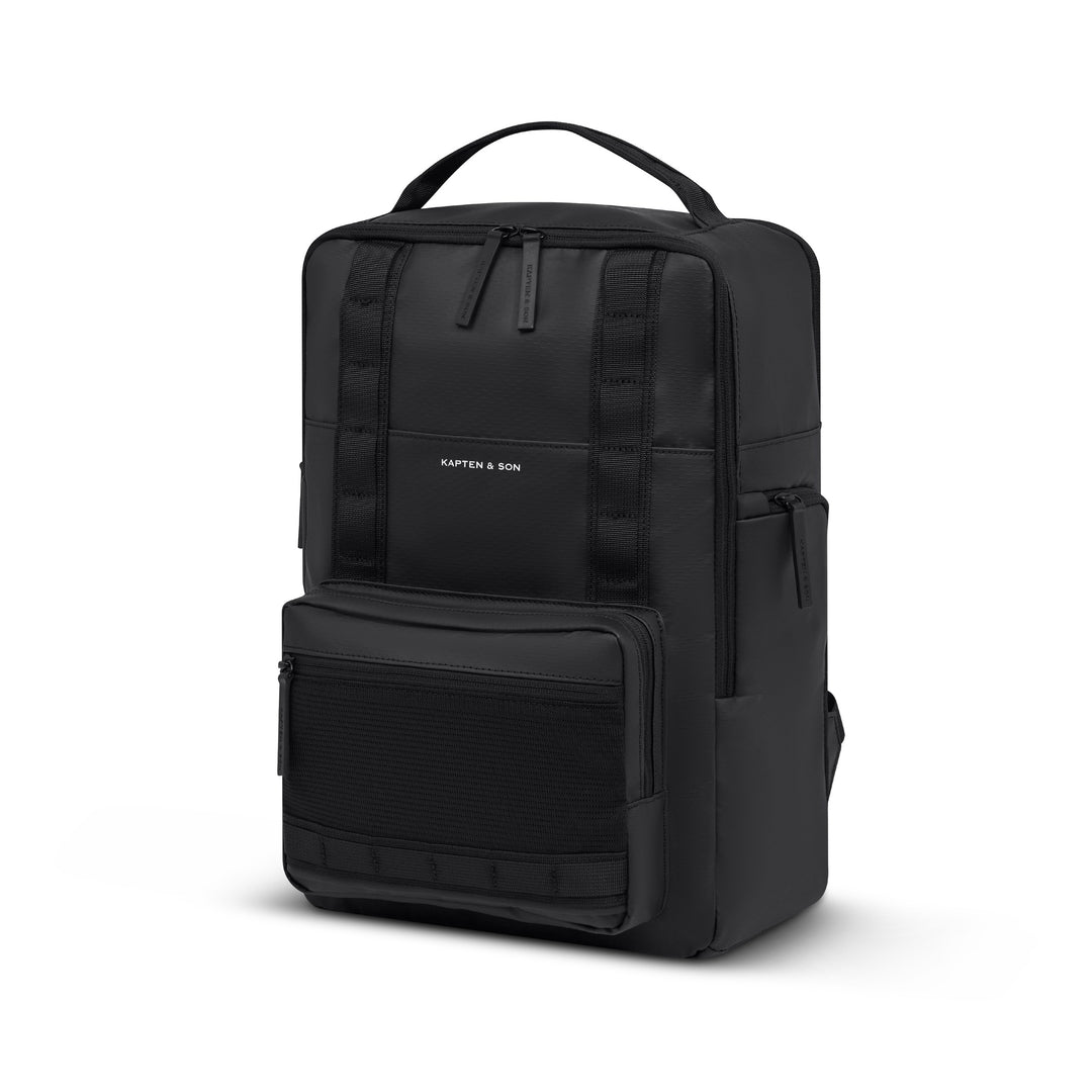 Kapten & Son Bergen Ultra backpack in All Black — three-quarter view of the water-repellent ripstop shell