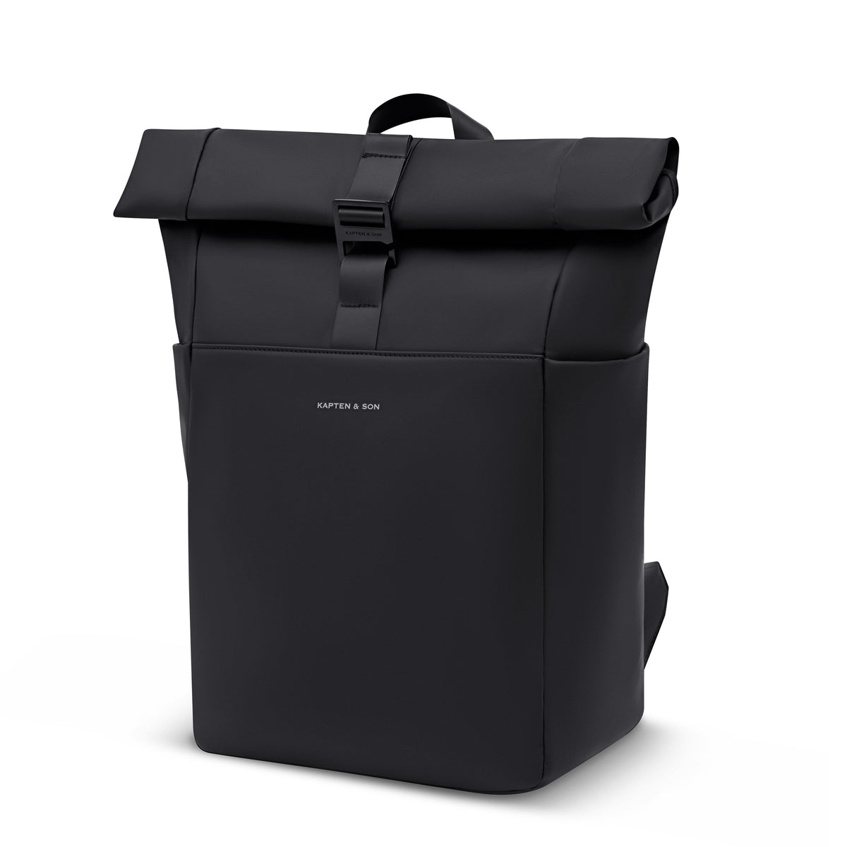 Kapten & Son Lund Sleek rolltop backpack in All Black, rolled, with the top handle and the hooked strap, three-quarter view