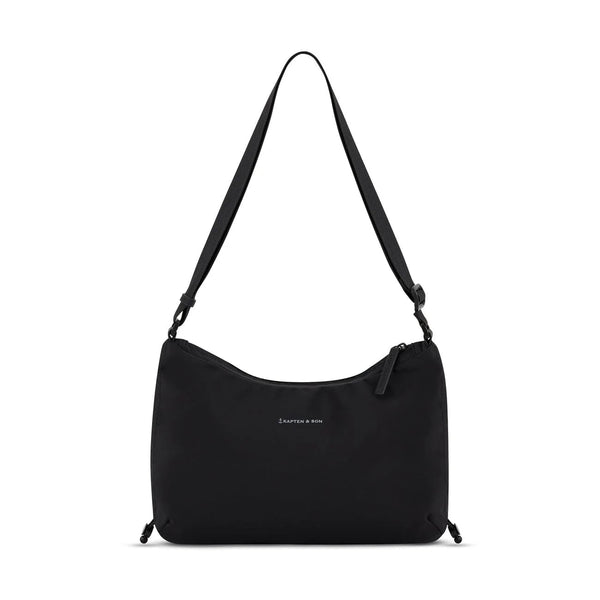 Kapten & Son Skara Small shoulder bag in black — compact crossbody with drawcord sides