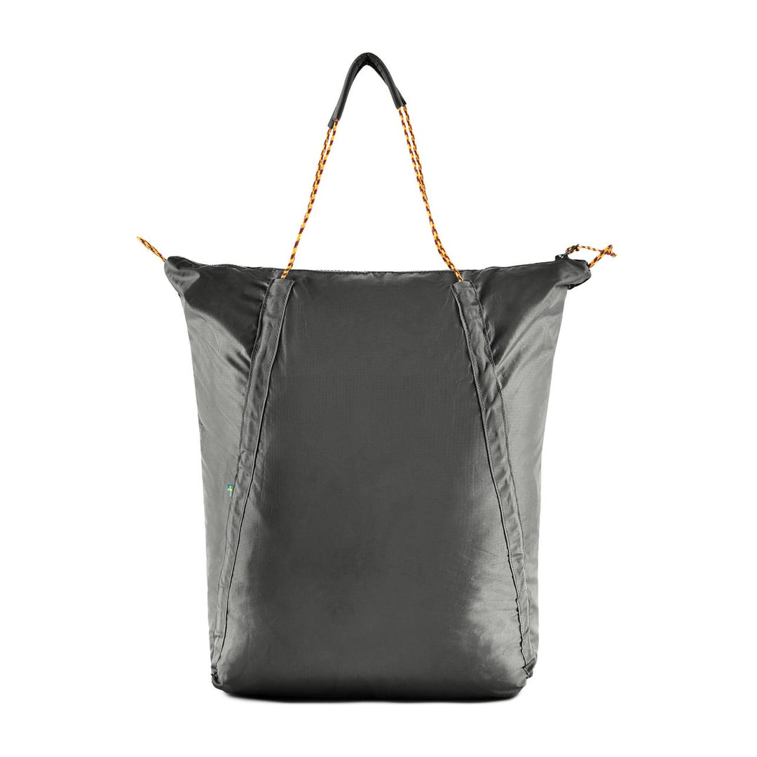 Klättermusen Gebo Bag 23L in Raven, packable tote bag, back view