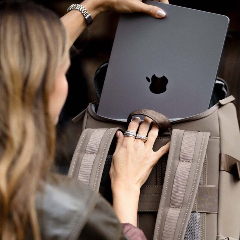 Close-up of the padded laptop sleeve on the Bali Medium Walnut backpack, offering secure protection for tech devices during commutes