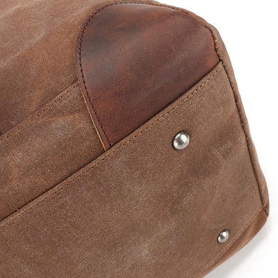 leather trim and protective rivet bag bottom
