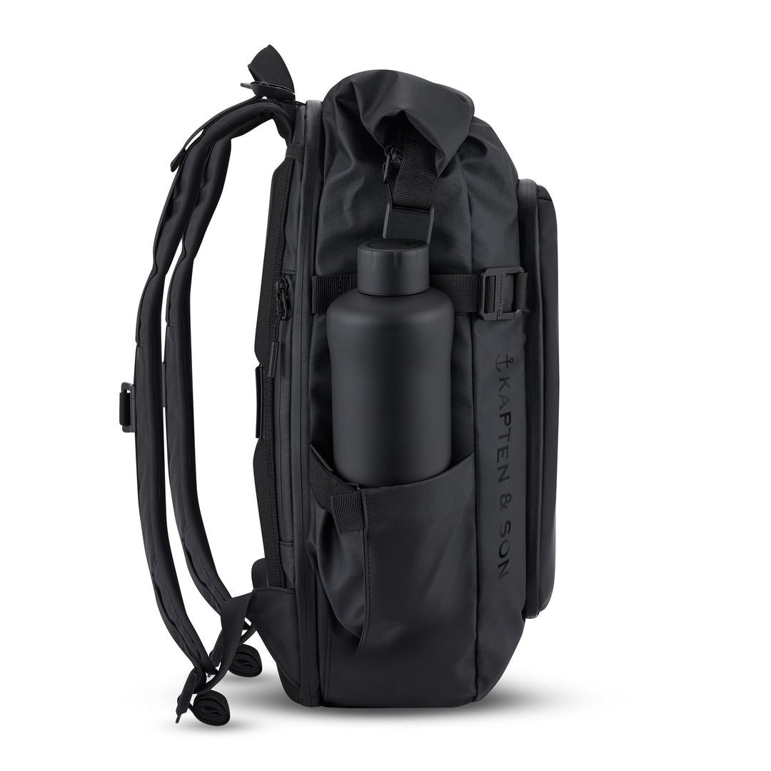 Side profile with water bottle in elastic pocket