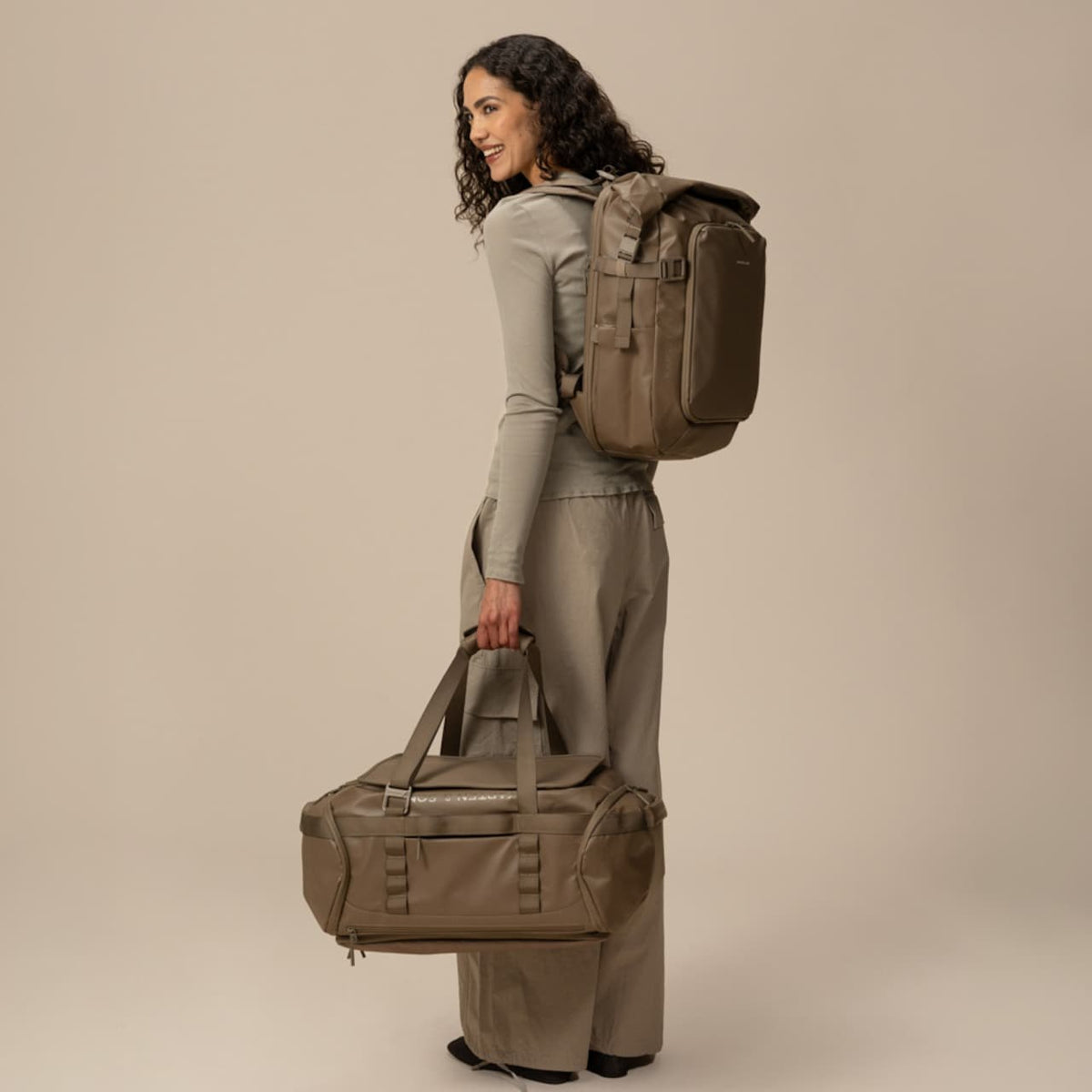 Woman wearing the Lisbon Pro walnut — rear view lifestyle