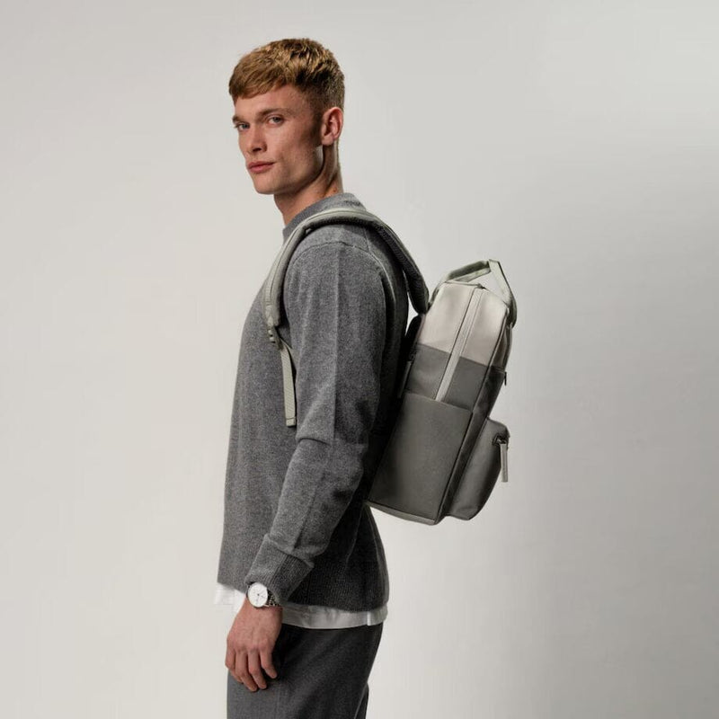 man wearing all muted sage bergen pro backpack kapten son