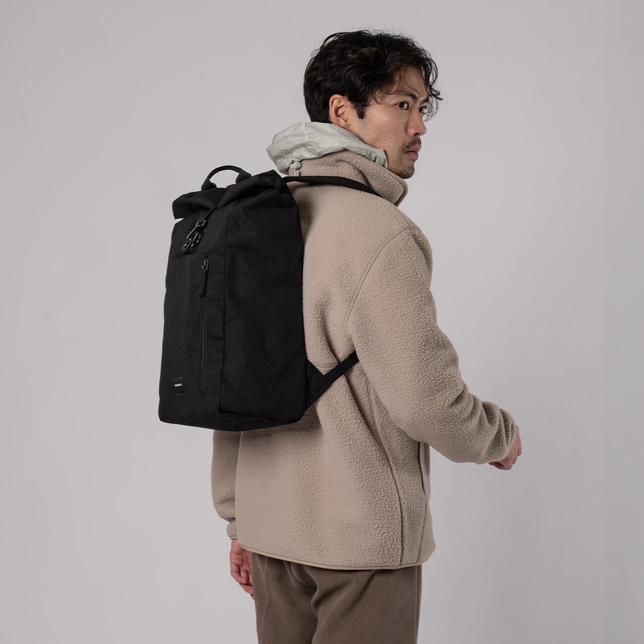 man wearing dante vegan sandqvist backpack black