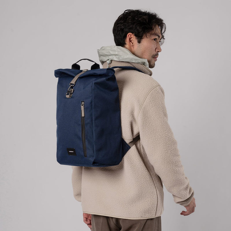 man wearing dante vegan sandqvist backpack navy blue