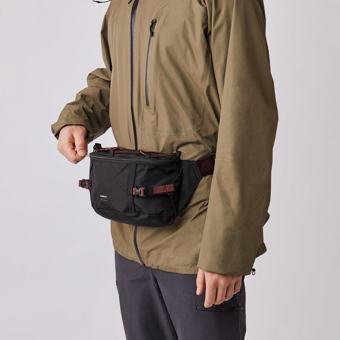 man wearing sandqvist allterrain hike all black as bum bag