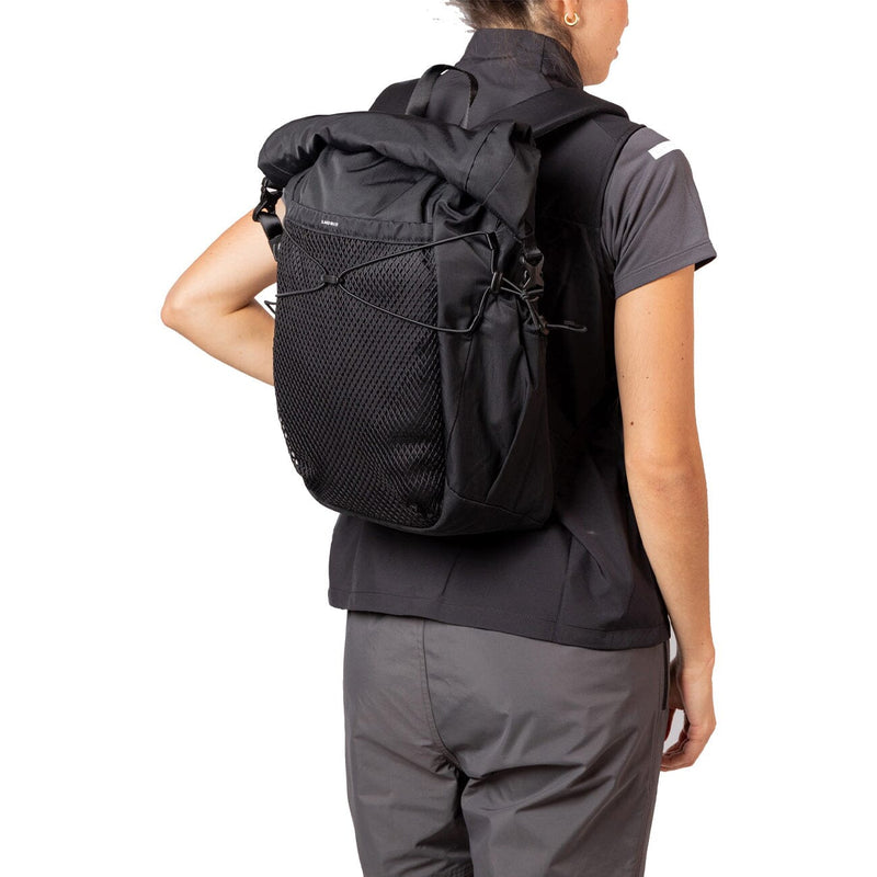 man wearing sandqvist louie backpack black