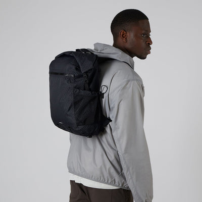 man wearing sandqvist nils backpack black