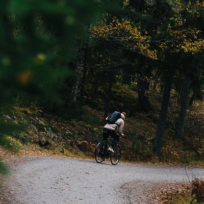 man bicycling wearing sandqvist jonatan black backpack