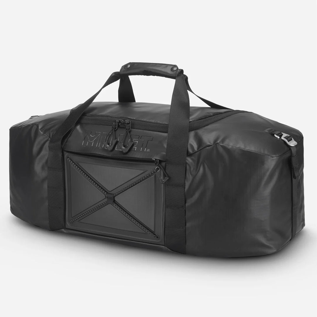 Millet Chamonix Duffle 35+10L Black — three-quarter side view showing compact silhouette and carry handles