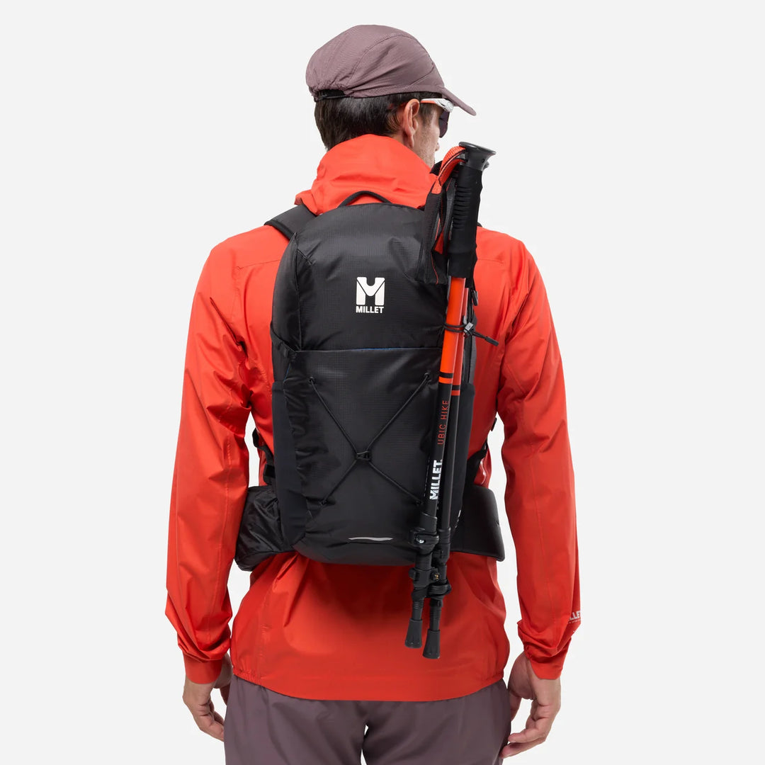 Seneca LT 22 worn back view with trekking poles attached