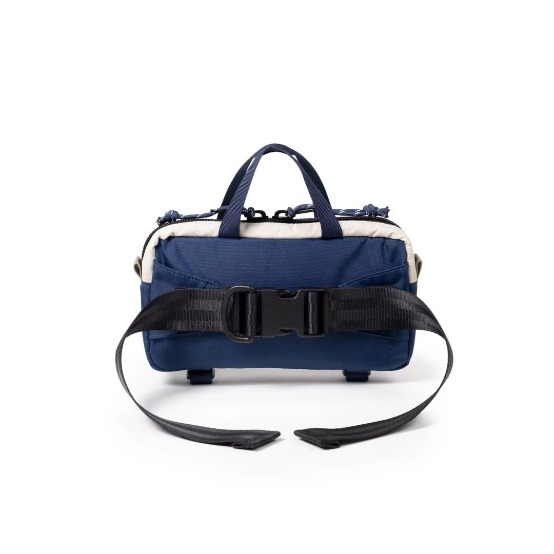 Rear view of the Mini Quick Pack in forest and bone white