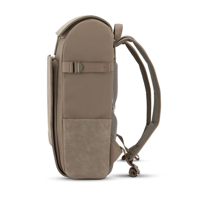 Streamlined side profile of the minimalist daypack in walnut tone, crafted from water-repellent recycled materials
