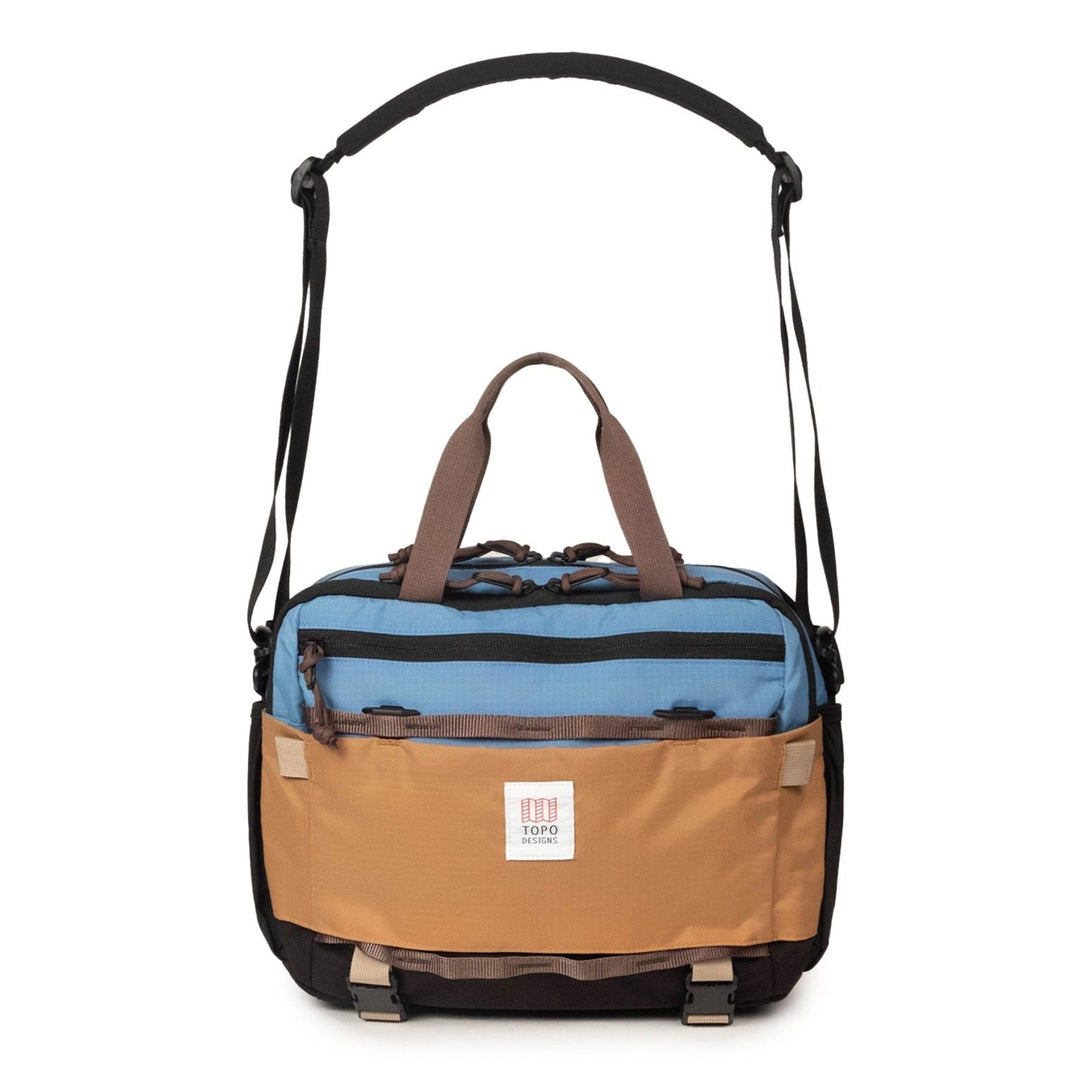 Mountain Cross Bag 14L in River Blue and Cobblestone with the removable shoulder strap extended