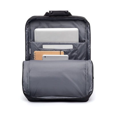Inside view of organized black backpack showcasing filled pockets and compartments