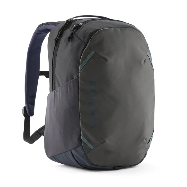 Patagonia Atom Daypack 24L Smolder Blue — front view with tonal blue accents and Patagonia logo