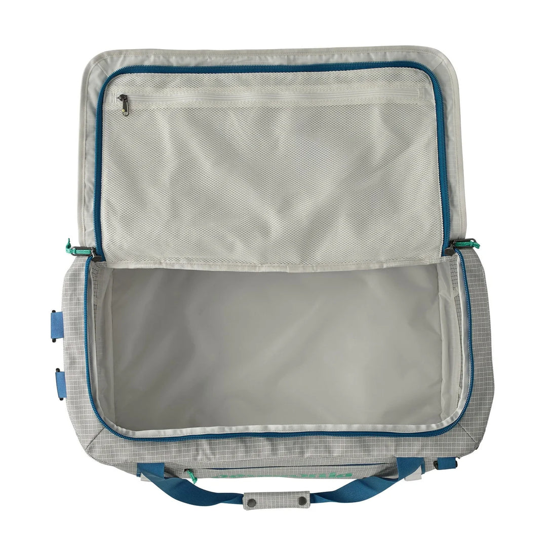 Black Hole Duffel 55L Birch White open showing the main compartment and mesh lid pockets