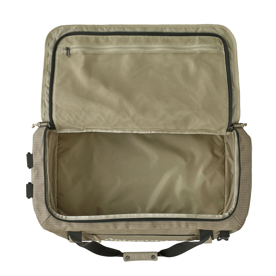 Black Hole Duffel 55L Weathered Stone open showing the main compartment and mesh lid pockets