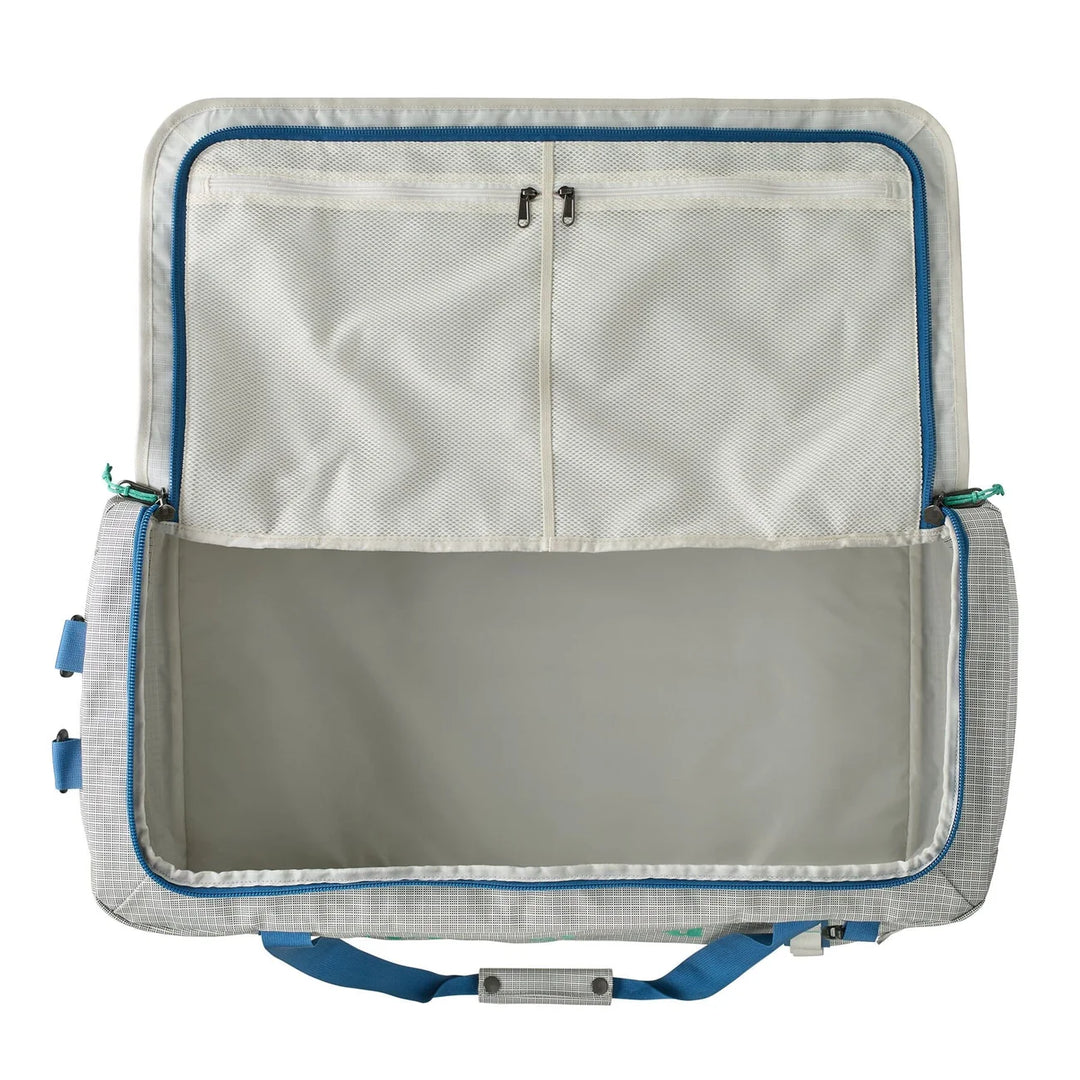 Black Hole Duffel 70L Birch White open showing the main compartment and mesh lid pockets