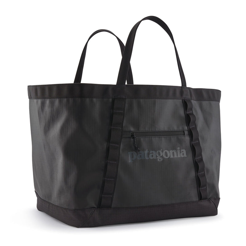 Black tote bag with Patagonia logo on a white background