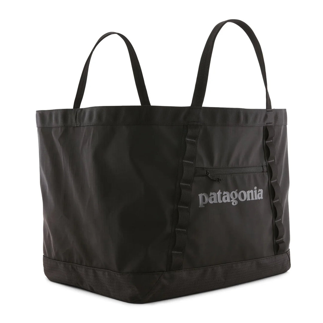 Patagonia Black Hole Gear Tote 61L Black — side view showing recycled ripstop fabric and handles