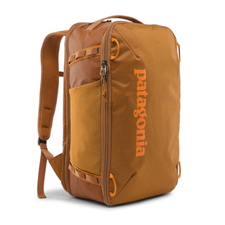Patagonia Black Hole Mini MLC 30L in Cinnamon Brown — three-quarter view with front pocket and compression straps
