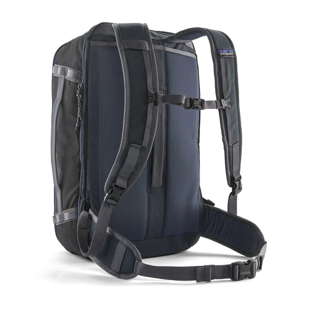 Patagonia Black Hole Mini MLC 30L Smolder Blue — back view with padded straps, sternum strap, and hip belt