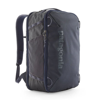 Patagonia Black Hole Mini MLC 30L Smolder Blue — three-quarter view with clamshell zip and Patagonia logo