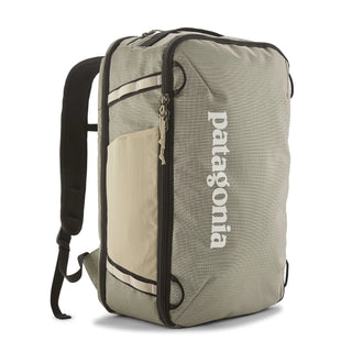 Patagonia Black Hole Mini MLC 30L Weathered Stone — three-quarter view with green logo and cream pocket