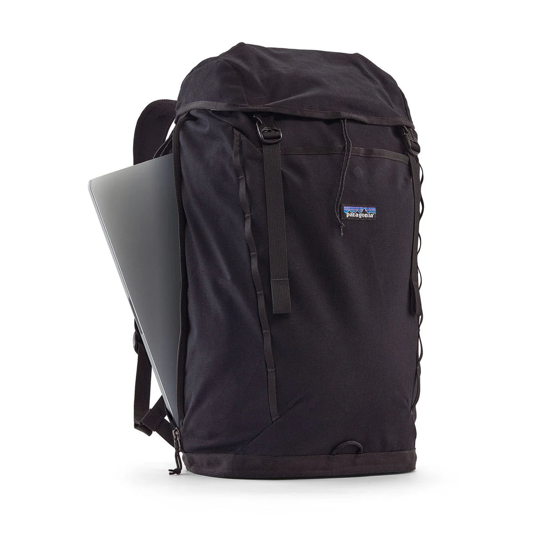 Fieldsmith Lid Pack 28L Black open showing the padded laptop sleeve compartment