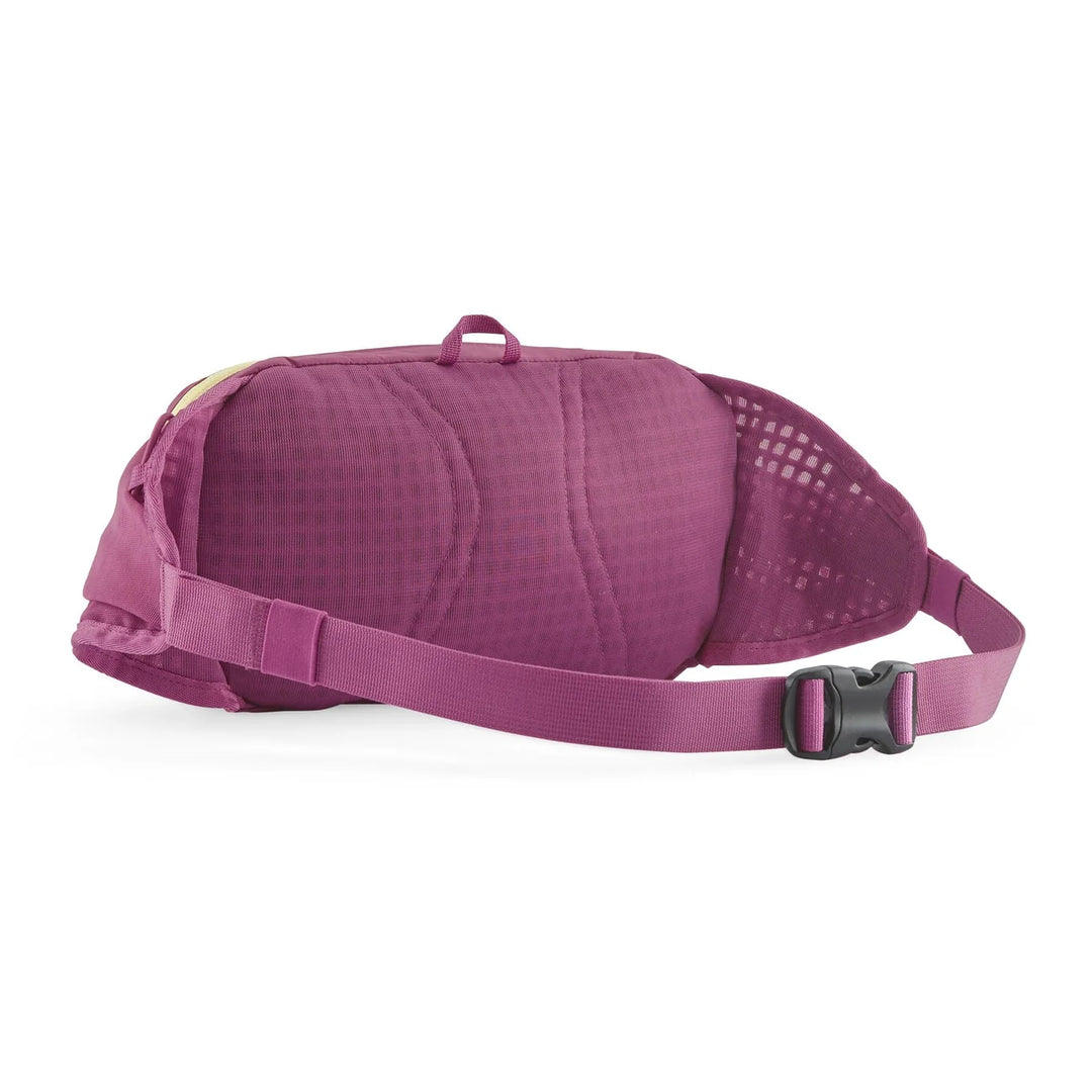Patagonia Terravia Hip Pack 5L Faded Magenta — back view with quilted padding and mesh ventilation