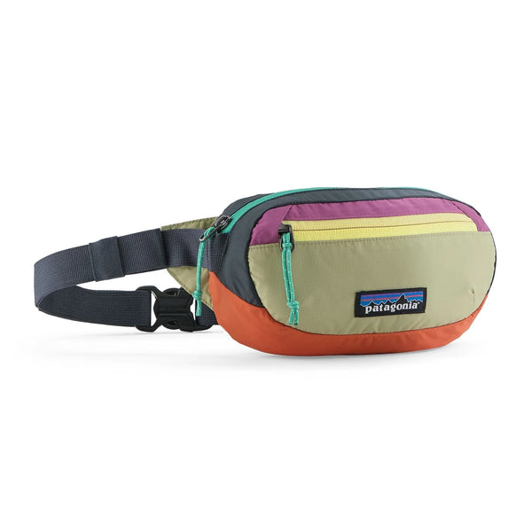 Patagonia Terravia Mini Hip Pack Patchwork Gumtree Green — front view with multicolor patchwork panels