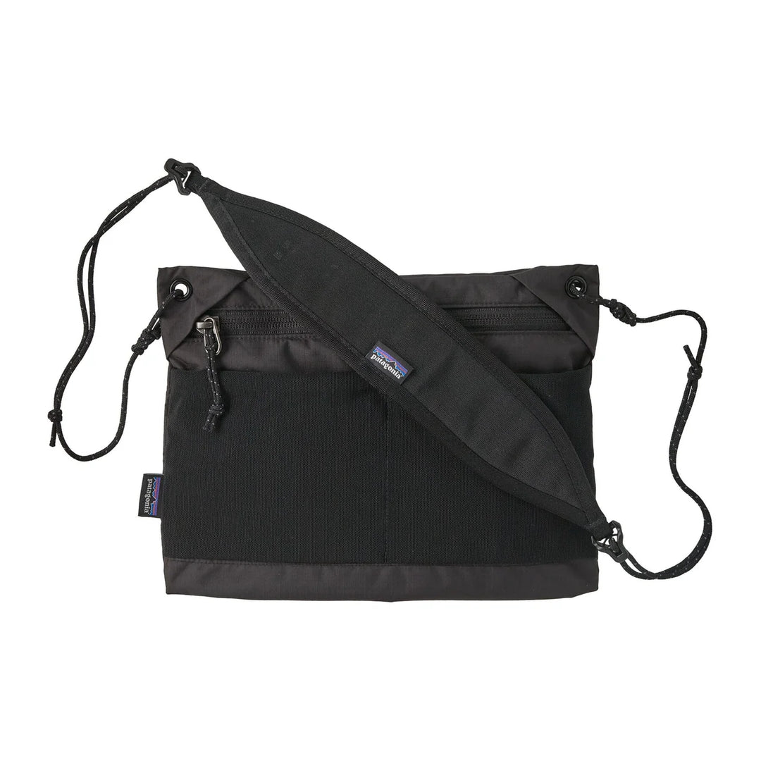 Patagonia Terravia Sacoche Bag 3L Black — front view with zip pocket and adjustable cord strap