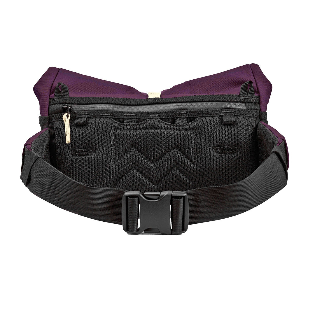 Rear view of the Piha Convertible Bike Bag in aubergine