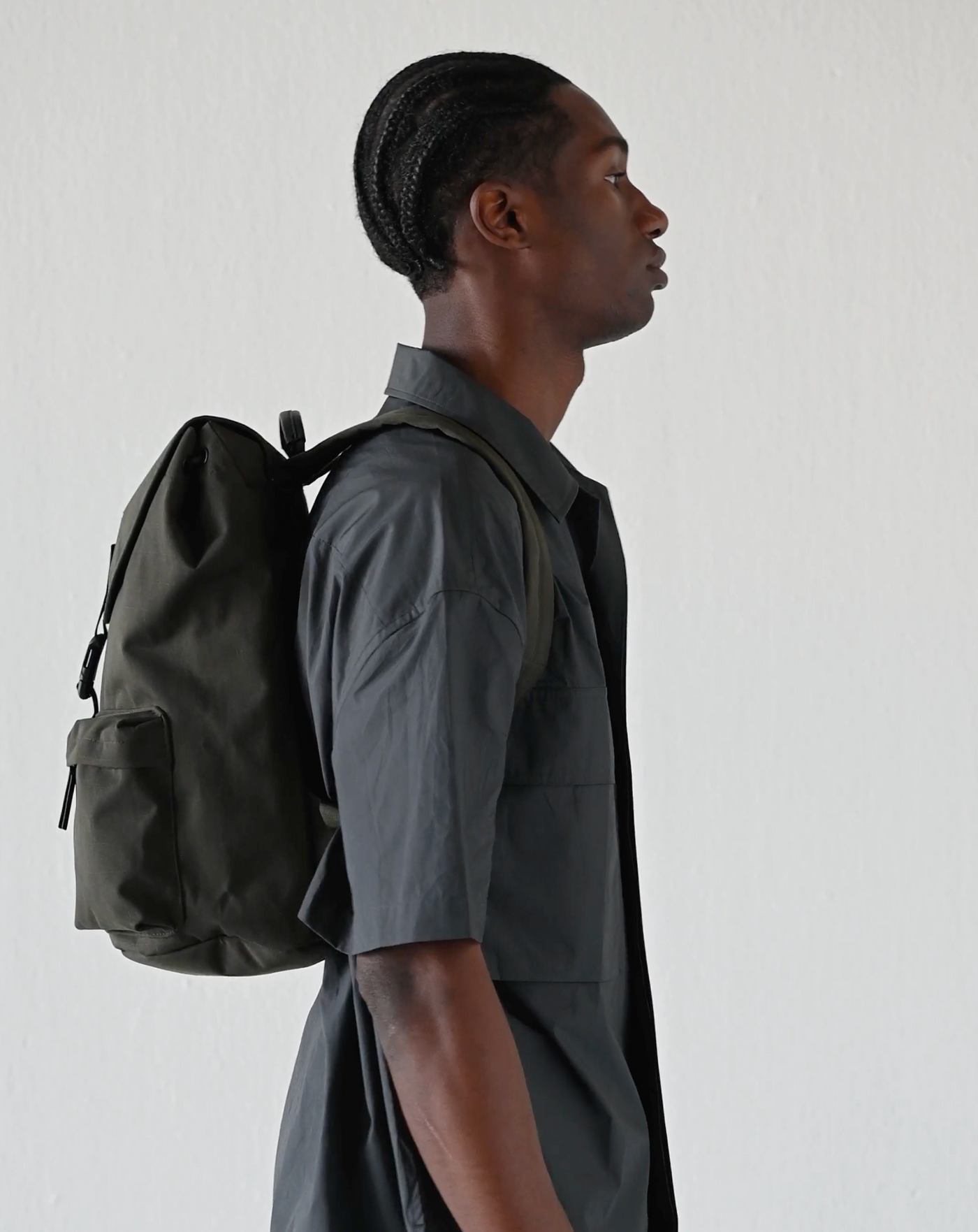 man wearing everyday rucksack sandqvist dark green