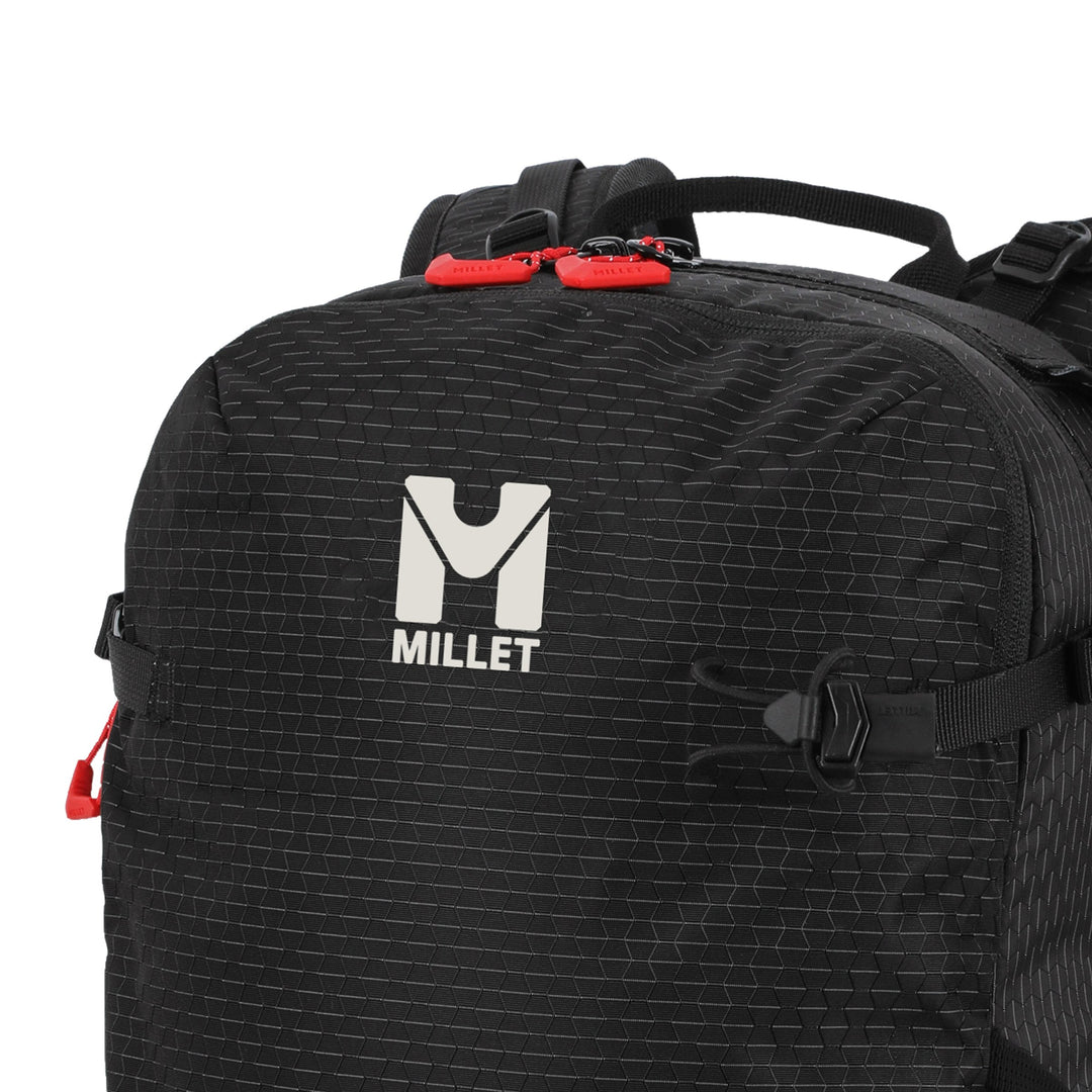 Millet Prolighter 22L black — front panel logo and red top zip detail