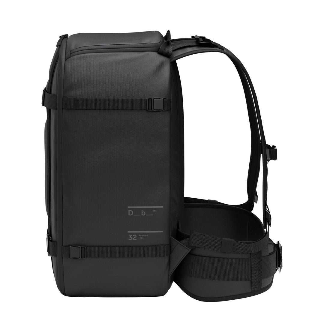 Ramverk Pro Backpack 32L in Black, side view of the shoulder straps, load adjusters and hip belt