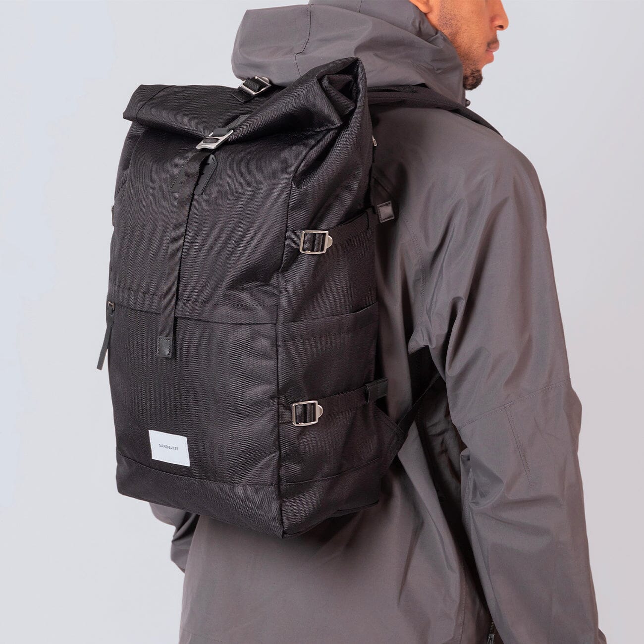recycled urban backpack bernt sandqvist black on man model